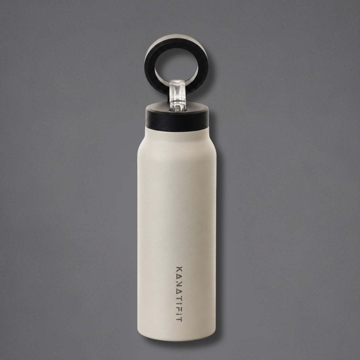 A matte off-white insulated water bottle with a black lid and a black carrying loop, featuring the vertical brand name 'KANATIFIT' printed on the front, set against a solid dark gray background.