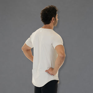 A man wearing a white athletic t-shirt, shown from the back and side against a solid gray studio background.