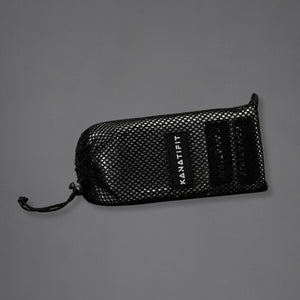 A black mesh drawstring pouch with a black label reading 'KANATIFIT' on a plain gray background.